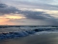 Evening waves. swimmers. Bali. Indonesia